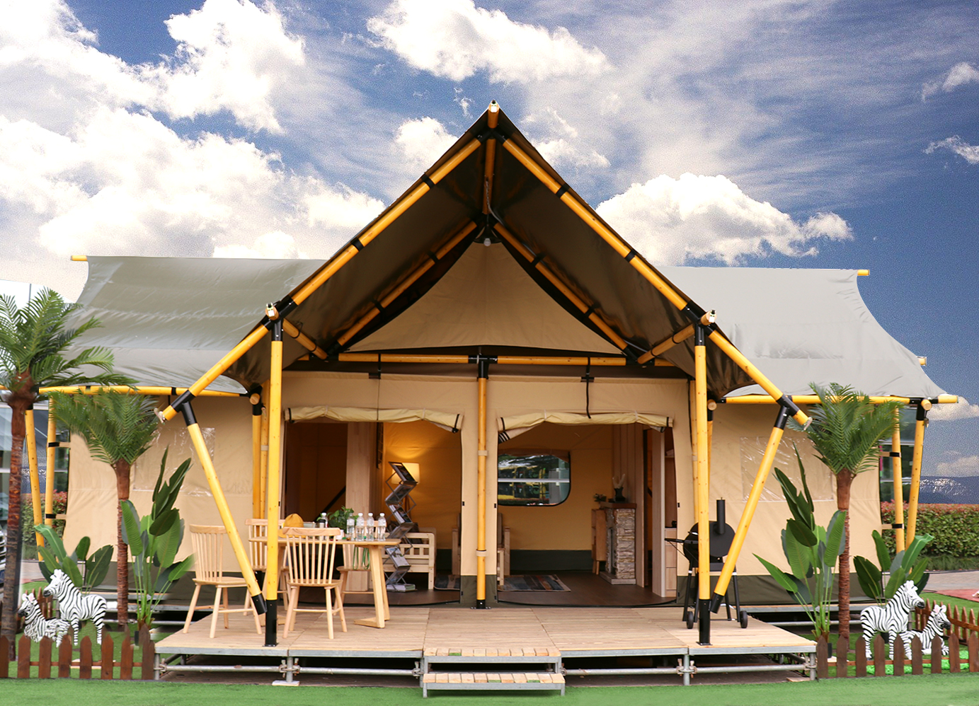 Casa de campaña safari de lujo en forma de T con dormitorio, baño y sala de estar